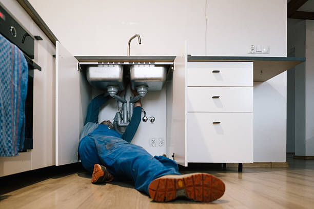 Professional Plumbing technician working in Holden, MA